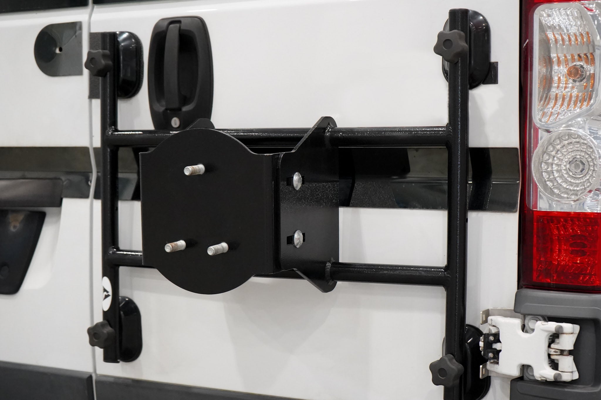 Door Mount for Tire Carrier, Bike Rack, or Ladder